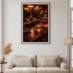 May include: A framed print featuring a still life with a vintage record player, a glass of whiskey with ice, a decanter, and a lit cigar in an ashtray. The scene is set on a dark wooden surface, with soft lighting.