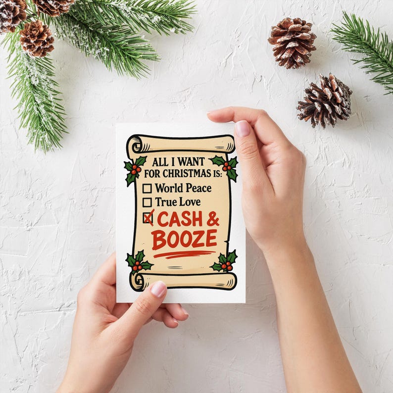 Puede incluir: Una tarjeta de Navidad con un dise&ntilde;o de pergamino, con el texto "ALL I WANT FOR CHRISTMAS IS:" seguido de casillas de verificaci&oacute;n para "World Peace", "True Love" y una casilla marcada para "CASH & BOOZE". La tarjeta est&aacute; sostenida por manos.