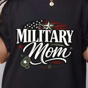 May include: A set of three ceramic mugs with a speckled, matte finish. The mugs are in shades of cream, light brown, and dark brown. Each mug has a simple, minimalist design and a rounded handle.