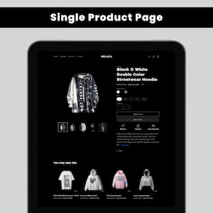 May include: A black tablet displays an e-commerce product page for a black and white double-color streetwear hoodie. The hoodie has the text "TRENDE UP" on the sleeves. Below are similar items.