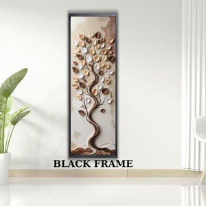 May include: A vertical wall art piece featuring a stylized tree with textured leaves in shades of brown, white, and gold. The artwork is set against a neutral background and framed in black. The text "BLACK FRAME" is at the bottom.