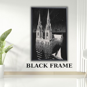 May include: A black and white framed wall art print featuring a gothic cathedral with twin spires partially submerged in water, with a small sailboat nearby. The artwork is enclosed in a simple black frame and includes the text BLACK FRAME.