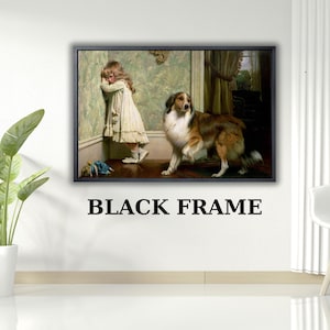 Op de afbeelding: Een ingelijste print met een klassiek schilderij van een jong meisje in een witte jurk dat haar gezicht verbergt, met een hond naast haar. De hond heeft bruin, wit en zwart haar. De lijst is zwart, met de tekst "BLACK FRAME" eronder.