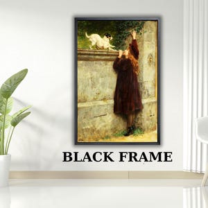 May include: A framed print of a classic painting. The artwork depicts a young person in a burgundy dress reaching up towards a small dog on a stone wall. The dog is white with black markings. The frame is black.