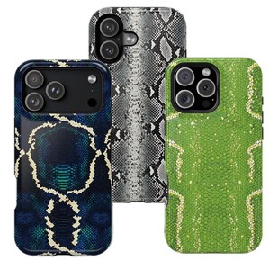 May include: Three phone cases with snake skin patterns. One case is dark blue with a white pattern, another is gray and white, and the third is green with a yellow pattern. The cases have camera cutouts.