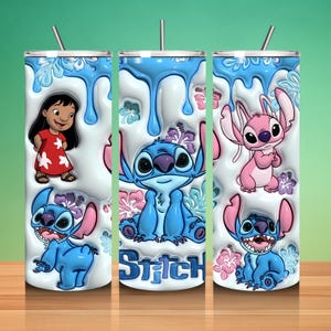 May include: Three stainless steel tumblers with straws, featuring characters from the animated film Lilo & Stitch. The tumblers have a white background with blue drips and floral accents. The word "Stitch" is printed on one tumbler.