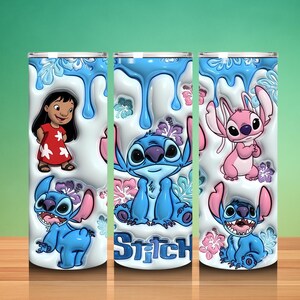 May include: A white tumbler featuring characters from the animated film Lilo & Stitch. The design includes Lilo, Stitch, and Angel, with blue dripped accents and floral details. The word "Stitch" is also displayed.