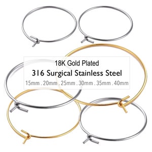 May include: A set of six hoop earrings in two different sizes and finishes. The earrings are made of 316 surgical stainless steel and are available in 18K gold plated and silver finishes. The earrings are available in sizes 15mm, 20mm, 25mm, 30mm, 35mm, and 40mm.