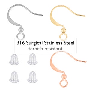 May include: Three pairs of earring hooks in silver, gold, and rose gold. Each hook has a small ball at the end and a loop for attaching earrings. The hooks are made of 316 surgical stainless steel, which is tarnish resistant. The image also shows four clear silicone earring backs.
