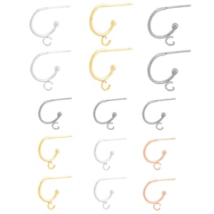 May include: Set of 15 hoop earrings with a dangling charm. The hoops are available in silver, gold, rose gold, and black. The charms are a letter 'C'.