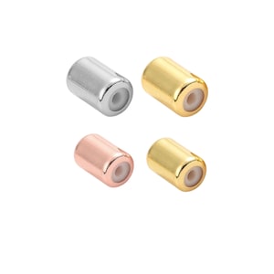 May include: Four metal end caps for jewelry making. The end caps are silver, gold, and rose gold.