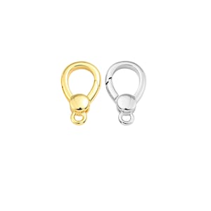 May include: Two metal lobster clasps, one gold-toned and one silver-toned, are displayed against a white background. Each clasp has a rounded top with a hinged opening and a small loop at the bottom for attaching jewelry.