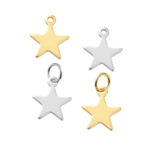May include: Four star-shaped charms, two gold and two silver, with jump rings for attaching to jewelry or other crafts.