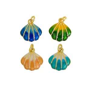 May include: Four seashell charms with gold-colored loops for jewelry making. Each charm is a different color: blue, green, orange, and teal. The shells have a gold outline and are filled with enamel paint.