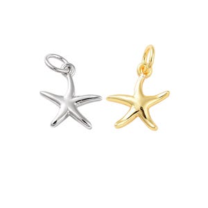 May include: Two starfish charms, one silver and one gold, with a loop for attaching to a necklace or bracelet.