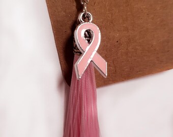 Llavero de concienciación con lazo rosa