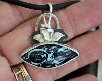 Petrified Palm stone and sterling silver art pendant.  The Alien.