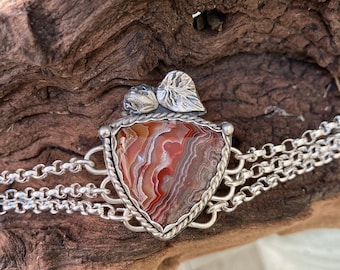 Crazy lace agate sterling silver bracelet.  Sized to fit.  “Crazy heart”