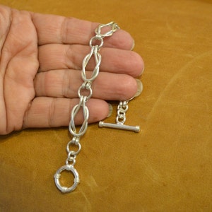 Bracelet à maillons Love Knot Sailors Knot en argent sterling. bracelet à maillons pour femme