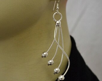 Sterling silver earrings.  Silver dangle earrings.  Rebel earrings.