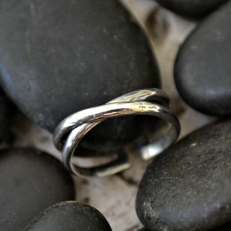 sterling silver X ring. adjustable. Cross my finger image 1