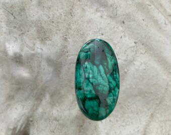 Malachite Jasper.  Stone, ring or pendant.  You choose.