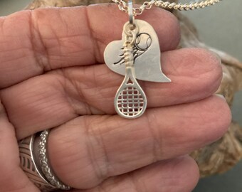 Sterling silver tennis necklace.  “Love tennis”