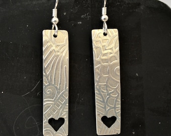 Sterling silver textured earrings with hand sawn hearts