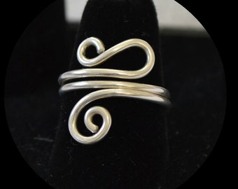 Adjustable ring 14K gold filled or sterling silver.  hand made.  "totally twisted"