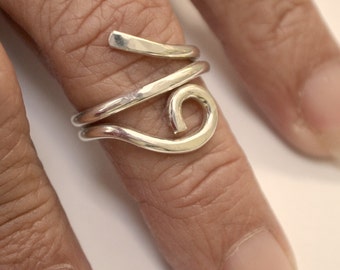 Sterling silver hand forged single loop hammered ring.  slightly adjustable