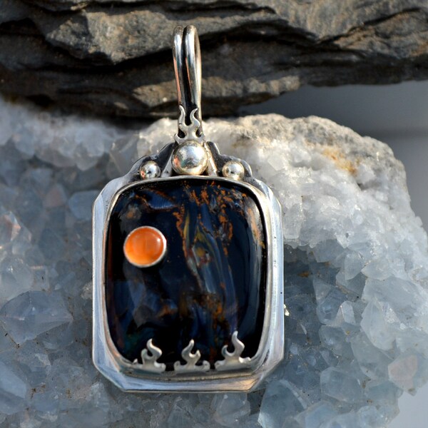 Pietersite with carnelian and a flame bezel.  Stone on Stone pendant.