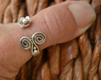 Adjustable thumb ring.  Sterling silver adjustable ring.