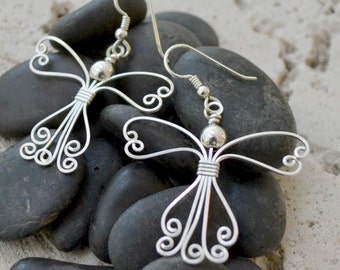 Angel earrings in sterling silver or 14K gold filled.  Wire wrapped earrings. Skirt style B.