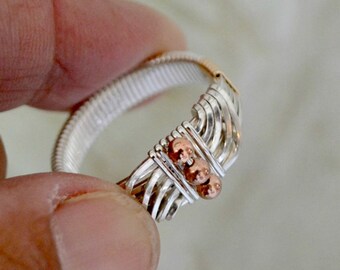Men's Ring.  Sterling Silver with gold and copper accents.  Wire wrapped Sultan's Ring.