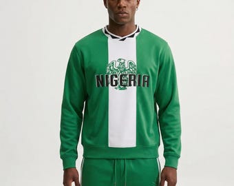 Conjunto de treino inspirado na seleção nigeriana de futebol | Moletom e calça de moletom brancos e verdes para torcedores de 2026 da The Jacket Studio Co.