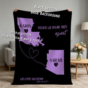 May include: A black fleece blanket featuring two purple state maps connected by a dashed heart-shaped line. The text reads KARIN, SARAH, THOUGH WE MAYBE MILES apart, and WELCOME VALENTINE heart. Each state map includes a small black heart icon.
