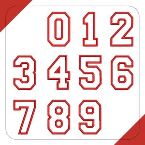May include: A set of red numbers 0 through 9, each with a white outline, displayed on a white background. The numbers have a collegiate or athletic style, with a bold, blocky font. The image is framed with a red border.