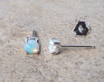 Genuine Opal  4mm (October Birthstone) stud earrings in Sterling Silver.