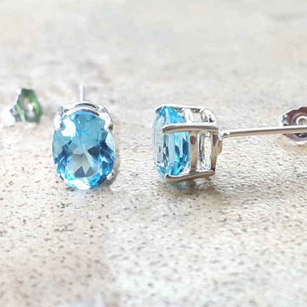 Blue Topaz stud earrings - Sky Blue Topaz oval stud earrings in silver or gold
