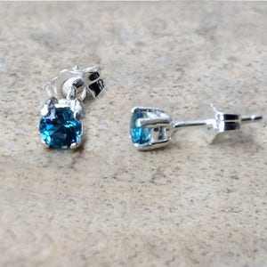 4mm genuine London Blue Topaz stud earrings in Sterling Silver or Gold