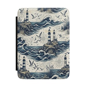 May include: A rectangular e-reader case featuring a nautical pattern with blue and cream tones. The design displays multiple lighthouses on rocky cliffs, crashing ocean waves, flying seagulls, anchors, and navigational compass rose motifs.