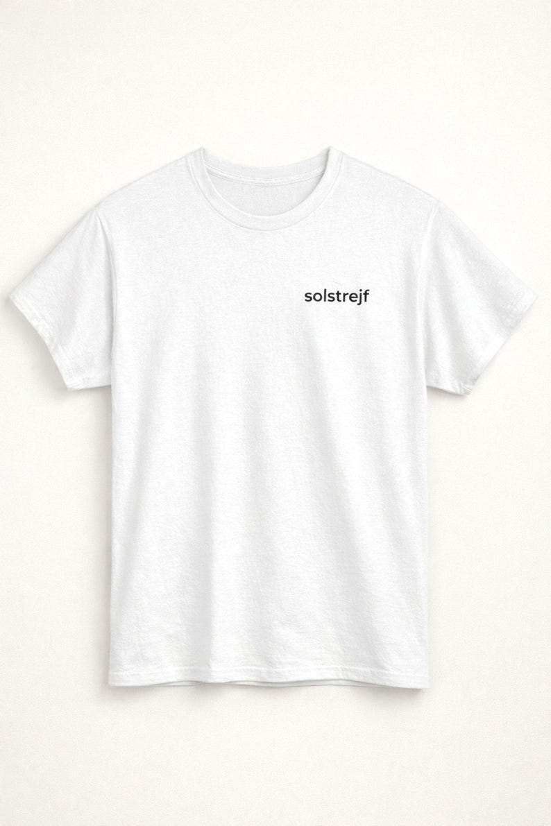 Minimalist white embroidered t-shirt product flat lay, clean neutral clothing, simple Scandinavian fashion basic