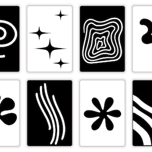 Könnte beinhalten: Set aus acht Schwarz-Weiß-Lernkarten mit verschiedenen abstrakten Formen. Designs umfassen eine Spirale, Sterne, ein labyrinthartiges Muster, eine wellenförmige Linie, einen Klecks, gebogene Linien, eine Blume und geschwungene Streifen.