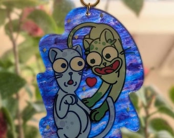 Llavero/Atrapasueños acrílico de los gatos de Terry & Korvo, de la colección Solar Opposites (Edición Limitada)