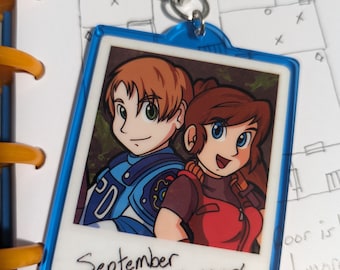 Llavero acrílico de Claire y Leon de Resident Evil 2