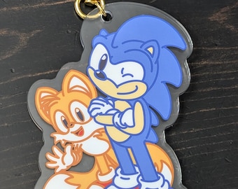 Llavero acrílico retro de Sonic y Tails