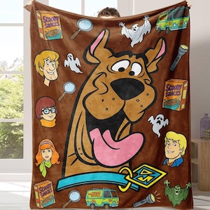Scooby-Doo flannel blanket It is made of soft and warm material and can be used as a decorative blanket on the bedside