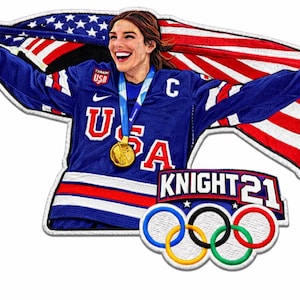 May include: Embroidered patch featuring a smiling athlete holding an American flag. She wears a blue jersey with "USA" and a gold medal. The patch includes the Olympic rings and "KNIGHT 21" text.