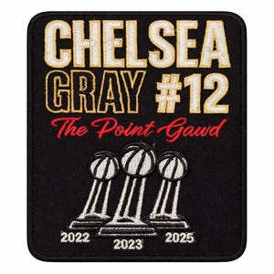 May include: Black embroidered patch featuring the text "CHELSEA GRAY #12 The Point Gawd" in gold and red. Below are three basketball trophies with the years 2022, 2023, and 2025.