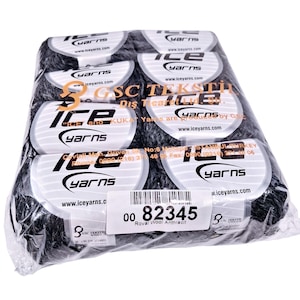 May include: A plastic-wrapped pack of eight skeins of dark gray, textured yarn. Each skein features a white label with the black Ice Yarns logo and website. A central sticker displays the barcode, the number 82345, and the text Royal Wool Anthracit.